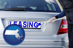 massachusetts silver car with LEASING painted in blue