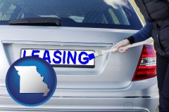 missouri silver car with LEASING painted in blue