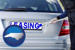 north-carolina map icon and silver car with LEASING painted in blue