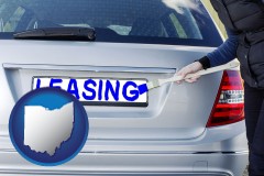ohio silver car with LEASING painted in blue