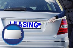 pennsylvania silver car with LEASING painted in blue