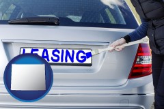 wyoming map icon and silver car with LEASING painted in blue