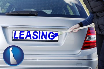 silver car with LEASING painted in blue - with Delaware icon