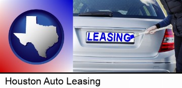 silver car with LEASING painted in blue in Houston, TX