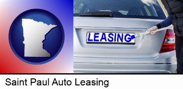 silver car with LEASING painted in blue in Saint Paul, MN